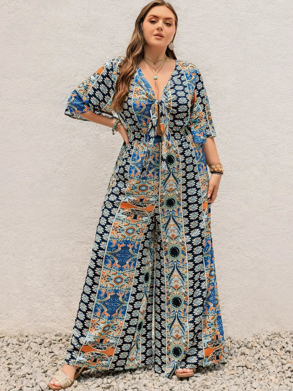 Plus Size Printed Half Sleeve Wide Leg Jumpsuit - LoveNest Treasures