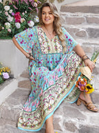Plus Size Printed Tie Neck Flutter Sleeve Maxi Dress - LoveNest Treasures