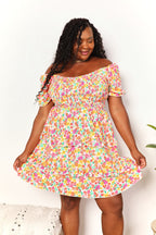 Devine Smocked Sweetheart Neck Flounce Sleeve Mini Dress - LoveNest Treasures