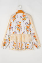 Plus Size Printed Tie Neck Long Sleeve Blouse - LoveNest Treasures