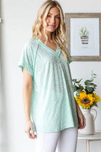 Heimish Full Size Exposed Seam V-Neck Short Sleeve Leopard Top Plus Size - LoveNest Treasures