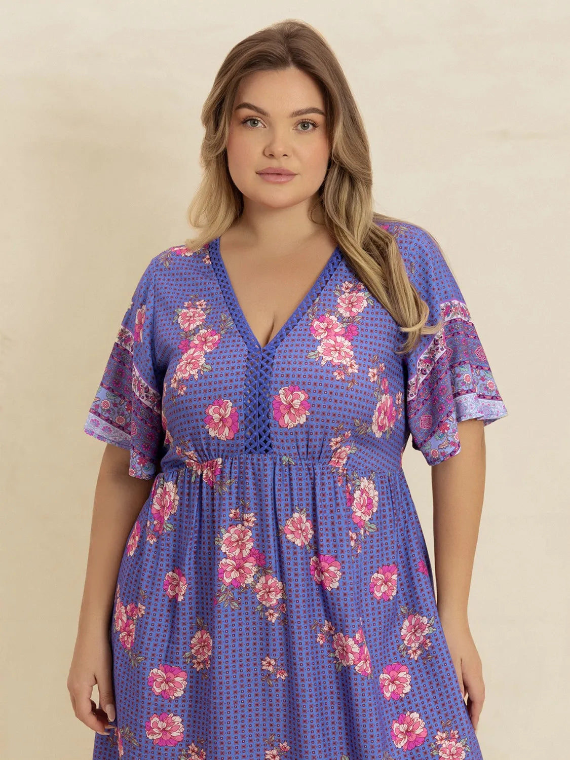Plus Size Printed V-Neck Flutter Sleeve Dress - LoveNest Treasures