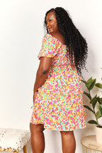 Devine Smocked Sweetheart Neck Flounce Sleeve Mini Dress - LoveNest Treasures