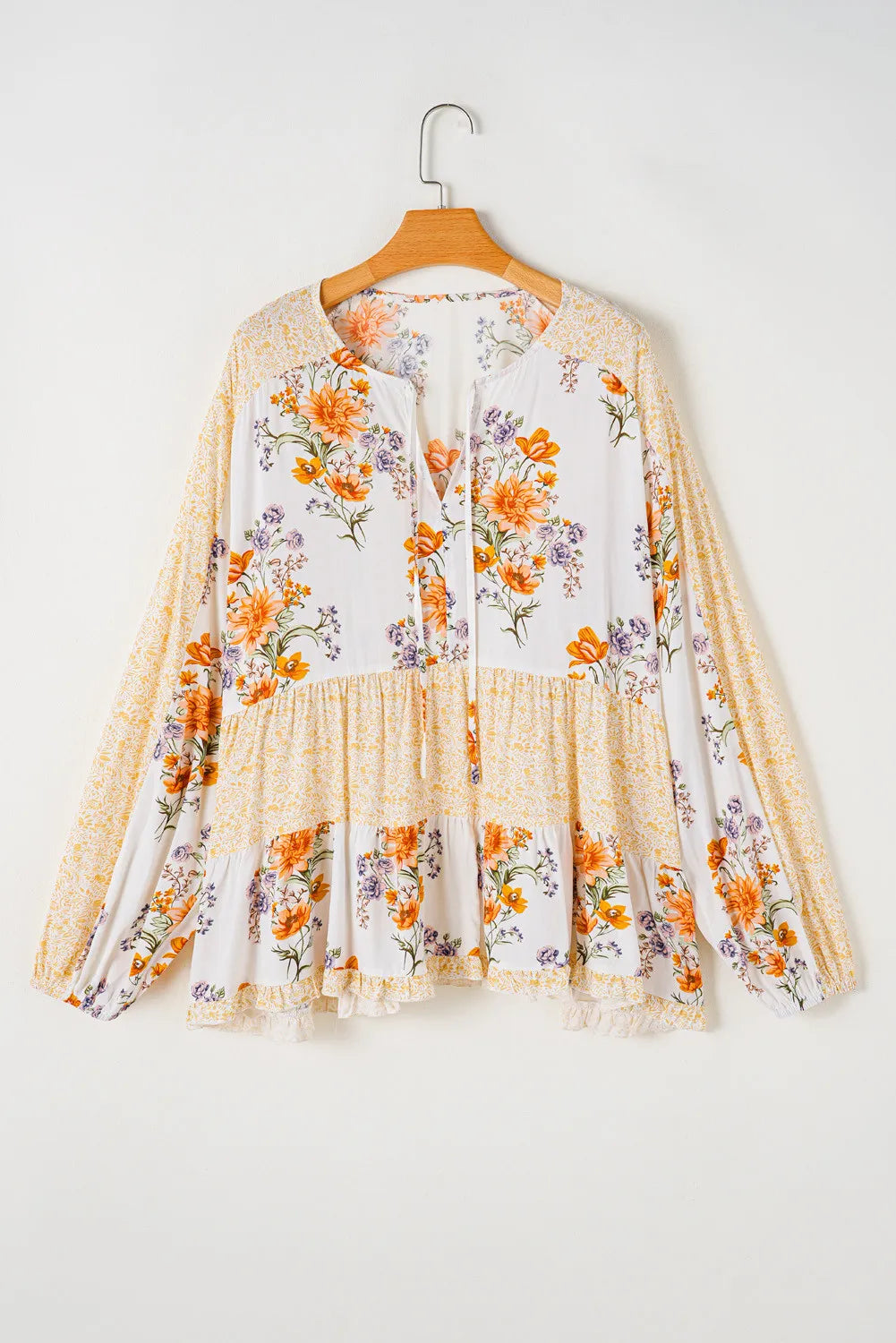 Plus Size Printed Tie Neck Long Sleeve Blouse - LoveNest Treasures