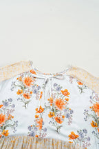 Plus Size Printed Tie Neck Long Sleeve Blouse - LoveNest Treasures