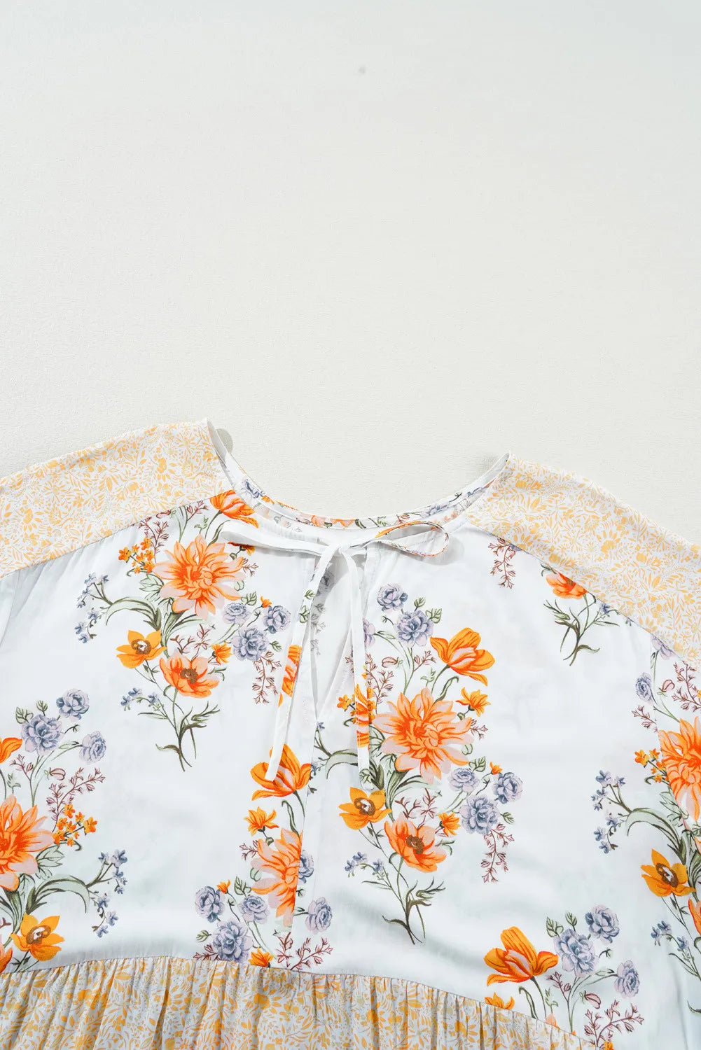 Plus Size Printed Tie Neck Long Sleeve Blouse - LoveNest Treasures
