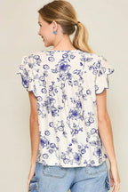 Umgee Full Size Floral Print Tassel Tie Neck Scalloped Sleeve Blouse Plus Size - LoveNest Treasures