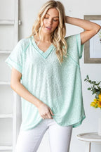 Heimish Full Size Exposed Seam V-Neck Short Sleeve Leopard Top Plus Size - LoveNest Treasures