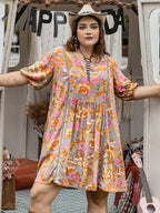 Plus Size Ruched Printed Half Sleeve Mini Dress - LoveNest Treasures