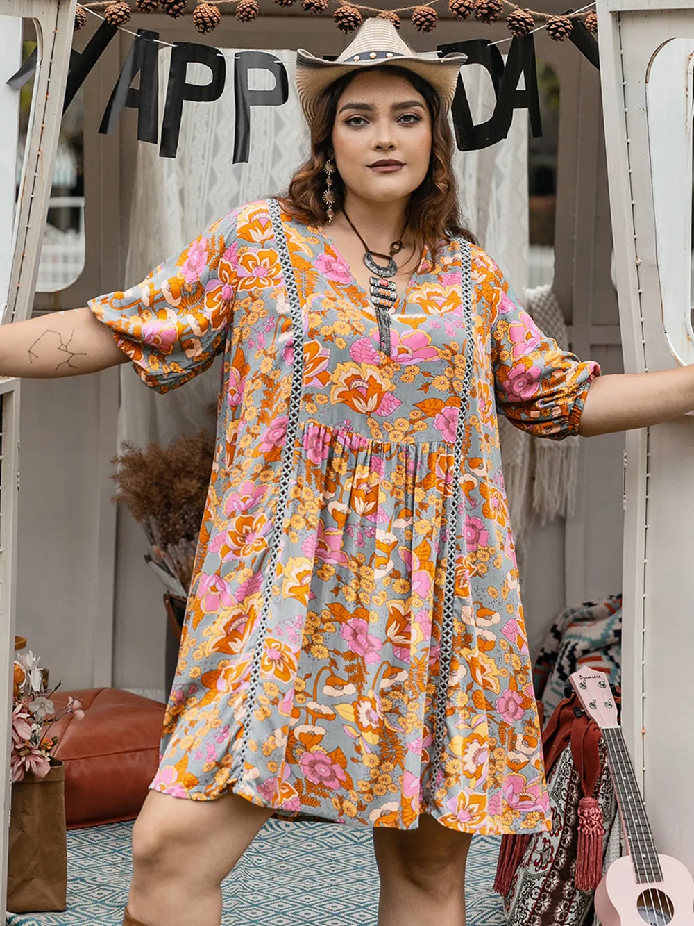 Plus Size Ruched Printed Half Sleeve Mini Dress - LoveNest Treasures