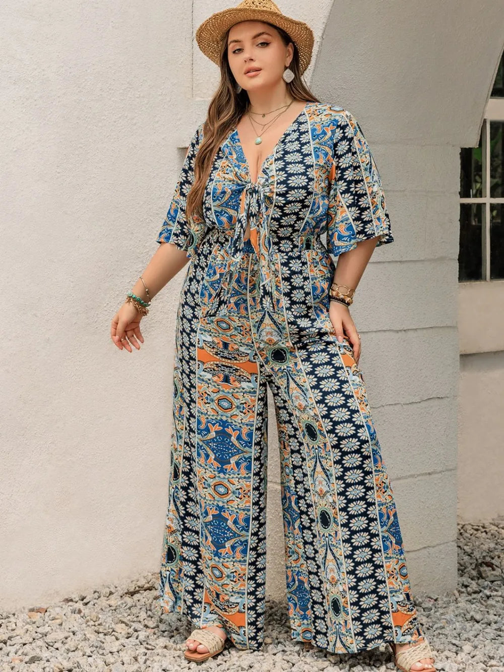 Plus Size Printed Half Sleeve Wide Leg Jumpsuit - LoveNest Treasures