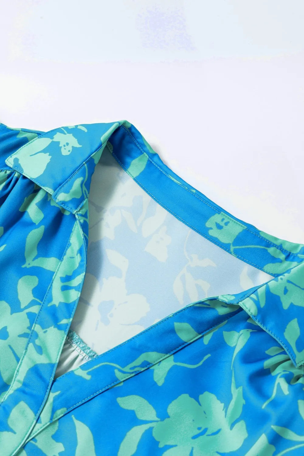 Plus Size Ruffled Printed Cap Sleeve Mini Dress - LoveNest Treasures