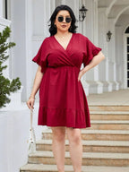 Plus Size Ruched Surplice Flounce Sleeve Mini Dress - LoveNest Treasures