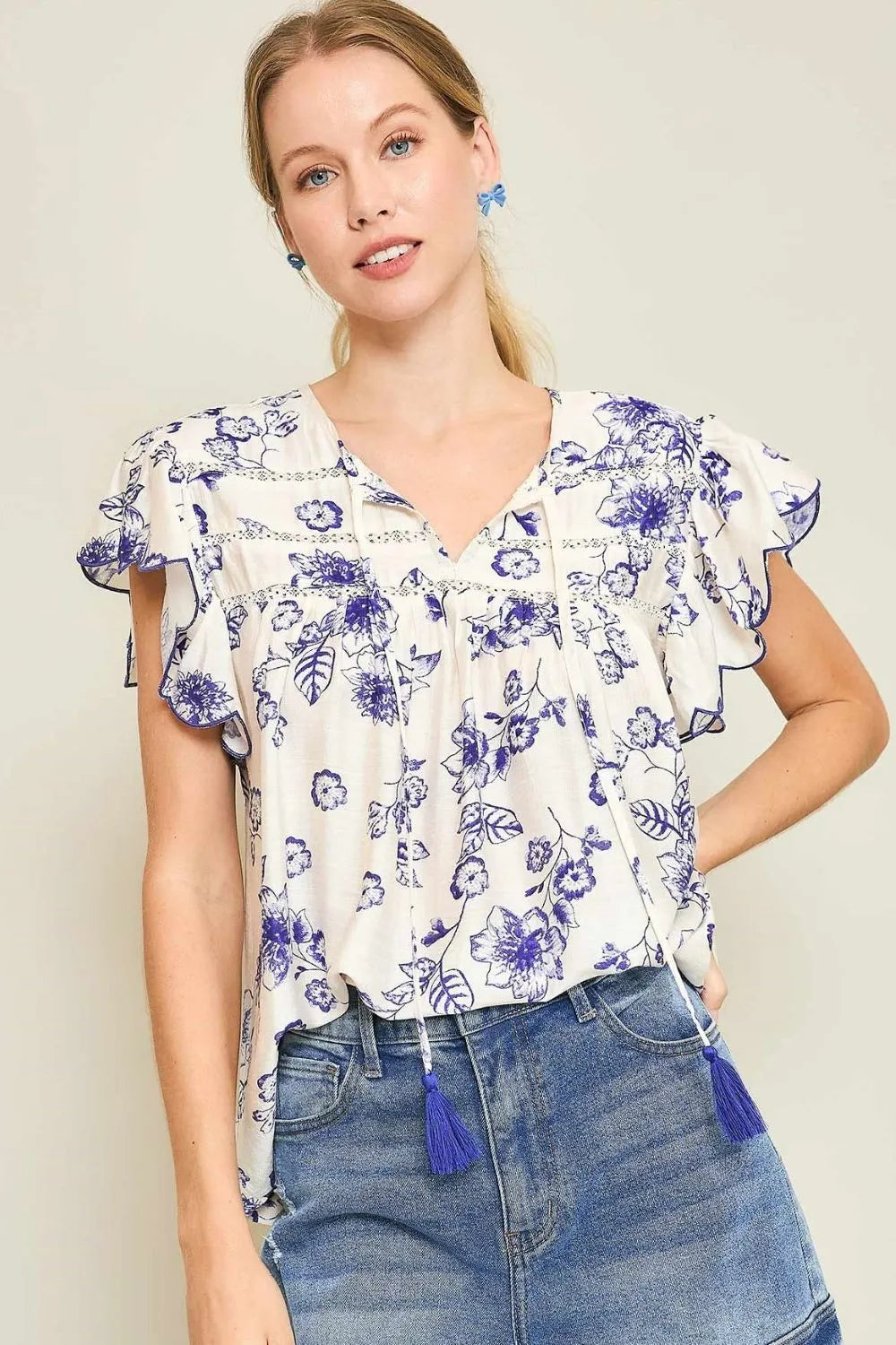 Umgee Full Size Floral Print Tassel Tie Neck Scalloped Sleeve Blouse Plus Size - LoveNest Treasures