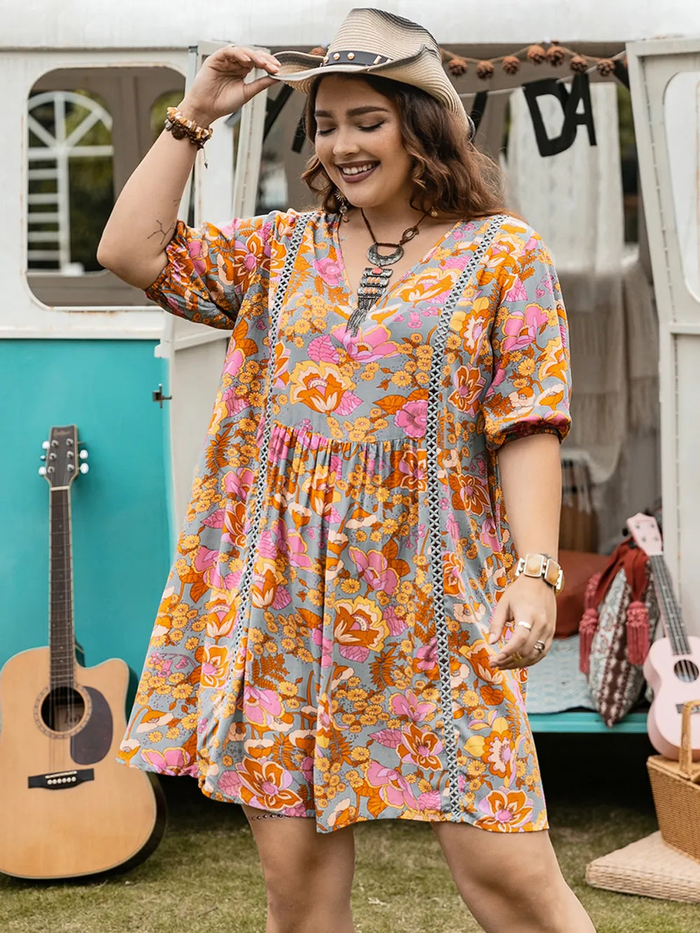 Plus Size Ruched Printed Half Sleeve Mini Dress - LoveNest Treasures