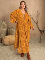Plus Size Printed Slit Long Sleeve Dress - LoveNest Treasures