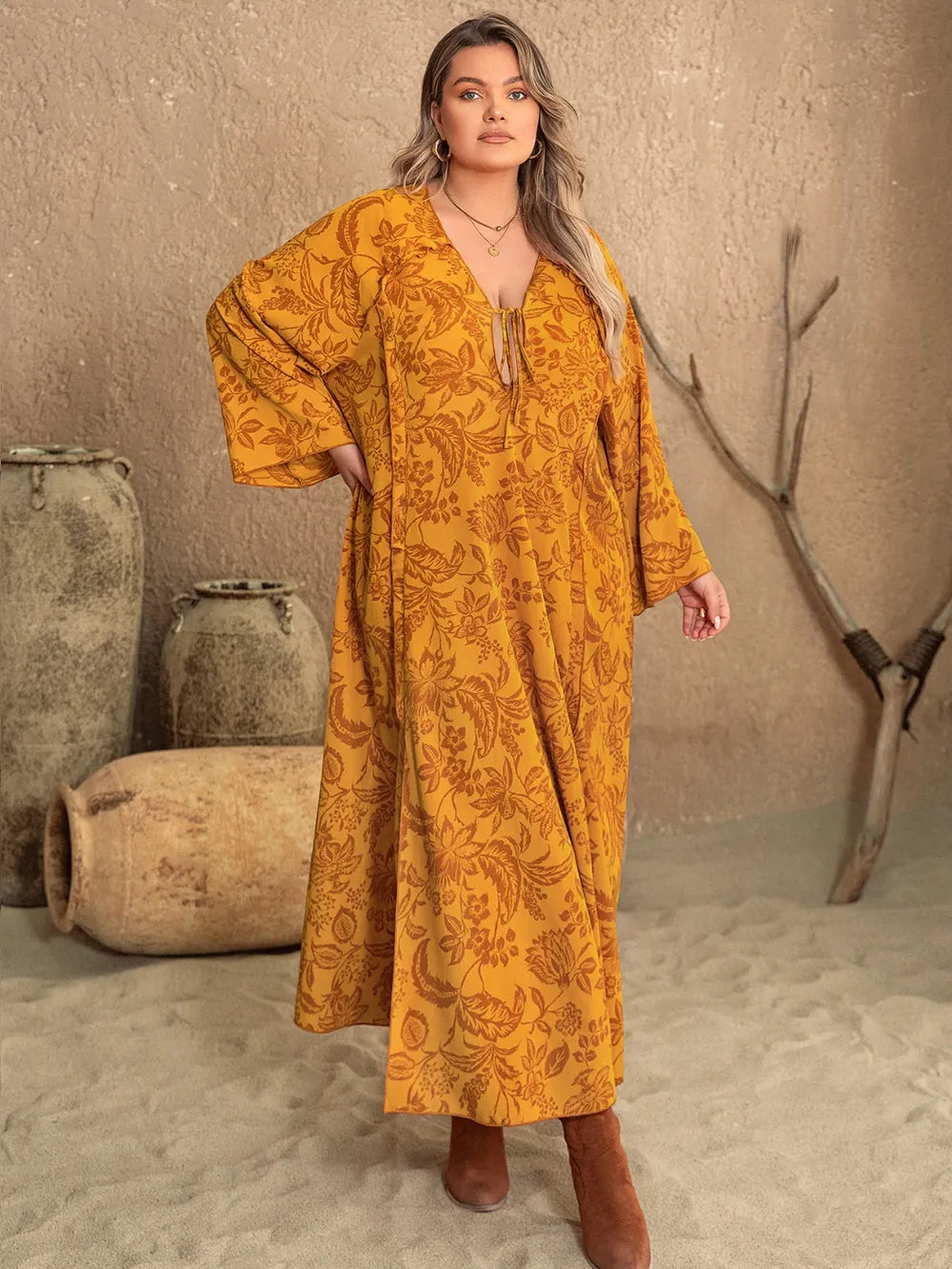 Plus Size Printed Slit Long Sleeve Dress - LoveNest Treasures