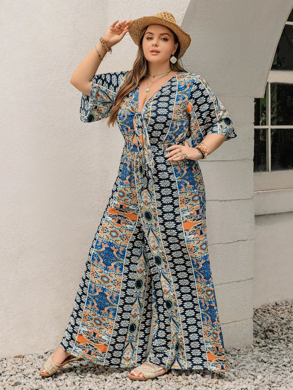 Plus Size Printed Half Sleeve Wide Leg Jumpsuit - LoveNest Treasures